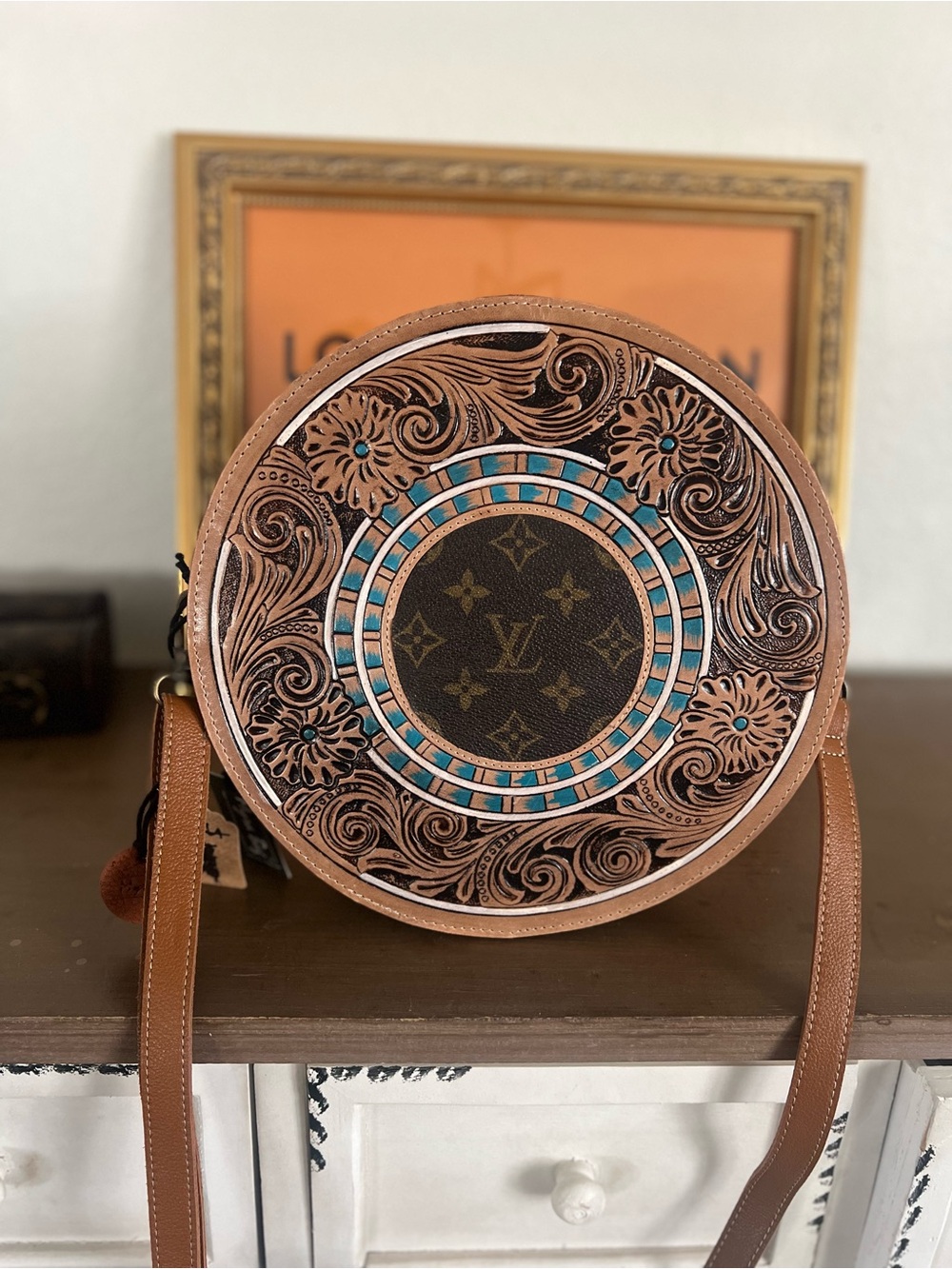 Brown Circular Leather Crossbody Bag with Turquoise Accents